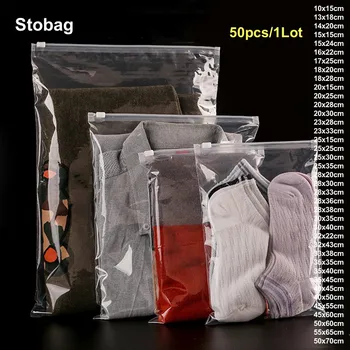 StoBag 50/20pcs Veľkoobchod PE Transparentné Oblečenie Zips Package Tašky Tričko Skladovanie Plastové Jasné, Tašky Cestovné Organizátor Logo